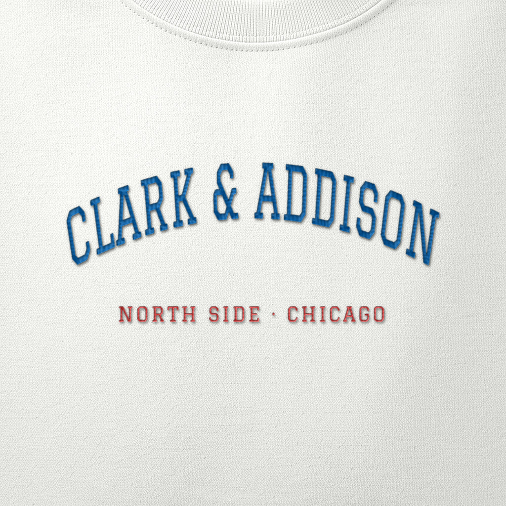 Close-up of the royal blue & red satin-stitch Clark & Addison embroidery