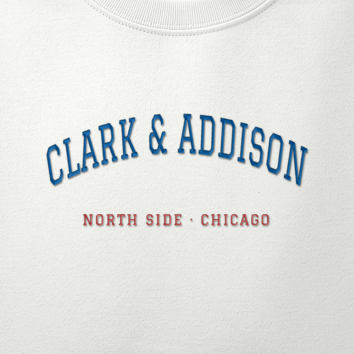 Close-up of the royal blue & red satin-stitch Clark & Addison embroidery