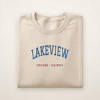 Chicago North Side Baseball Embroidered Crewneck — Lakeview in Sand, flat lay