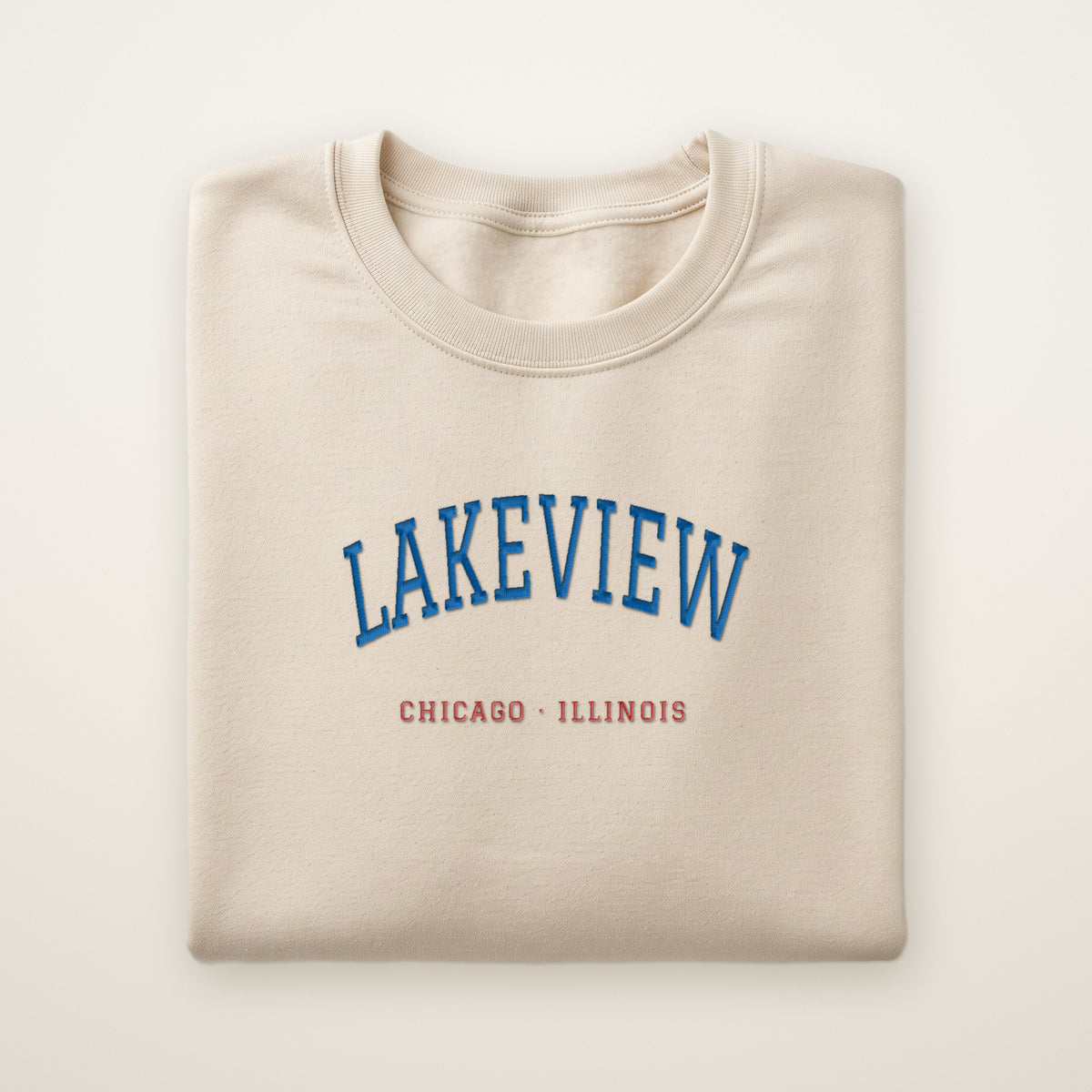 Chicago North Side Baseball Embroidered Crewneck — Lakeview in Sand, flat lay