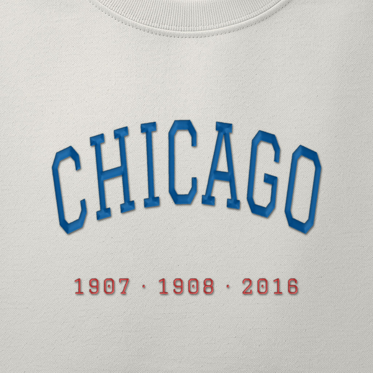 Close-up of the royal blue & red satin-stitch Title Years embroidery
