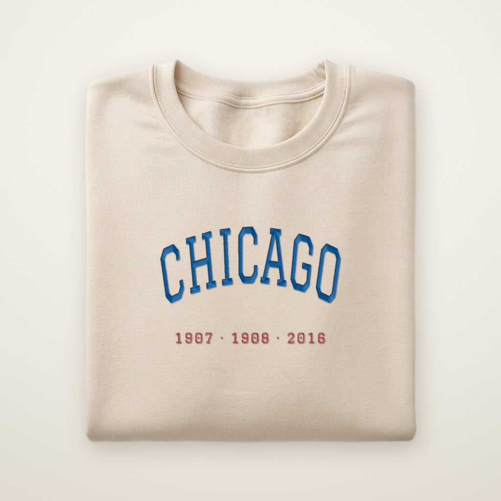 Chicago North Side Baseball Embroidered Crewneck — Title Years in Sand, flat lay
