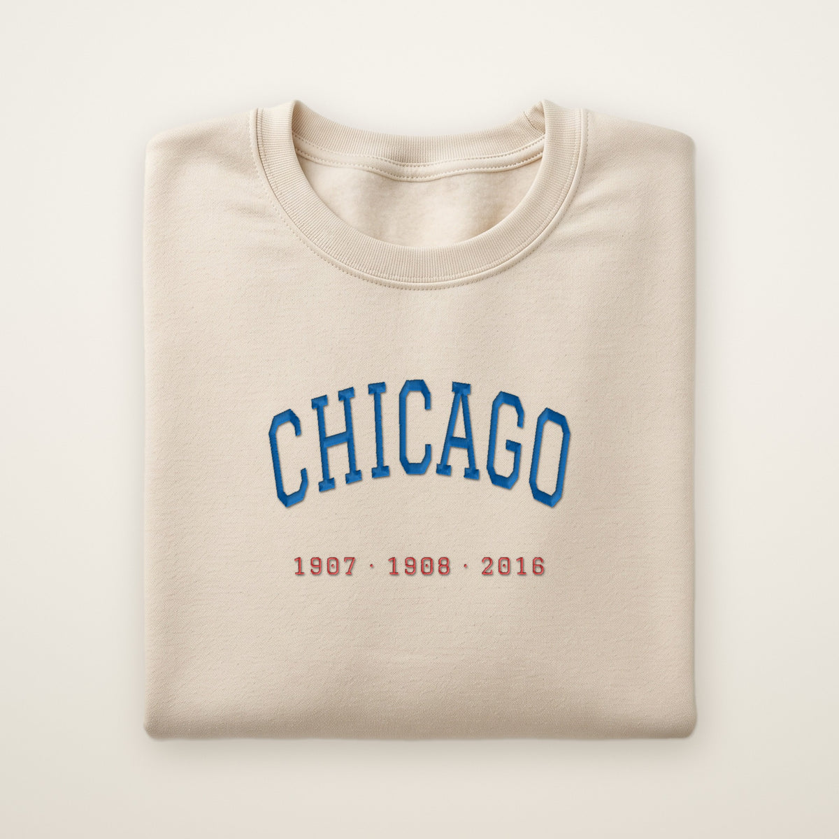 Chicago North Side Baseball Embroidered Crewneck — Title Years in Sand, flat lay