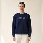 Model wearing the Chicago North Side Baseball Windy City embroidered crewneck