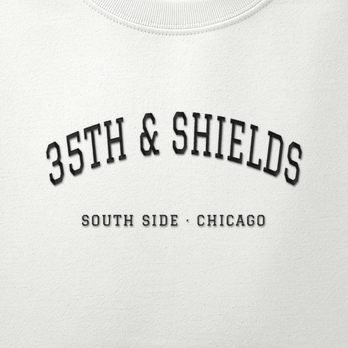 Close-up of the black satin-stitch 35th & Shields embroidery