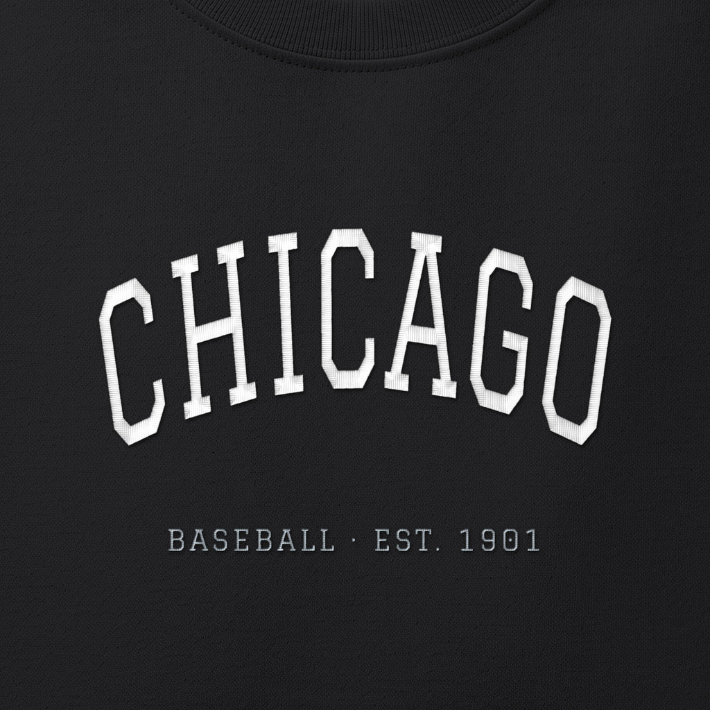 Close-up of the white & silver grey satin-stitch Chicago Arch embroidery