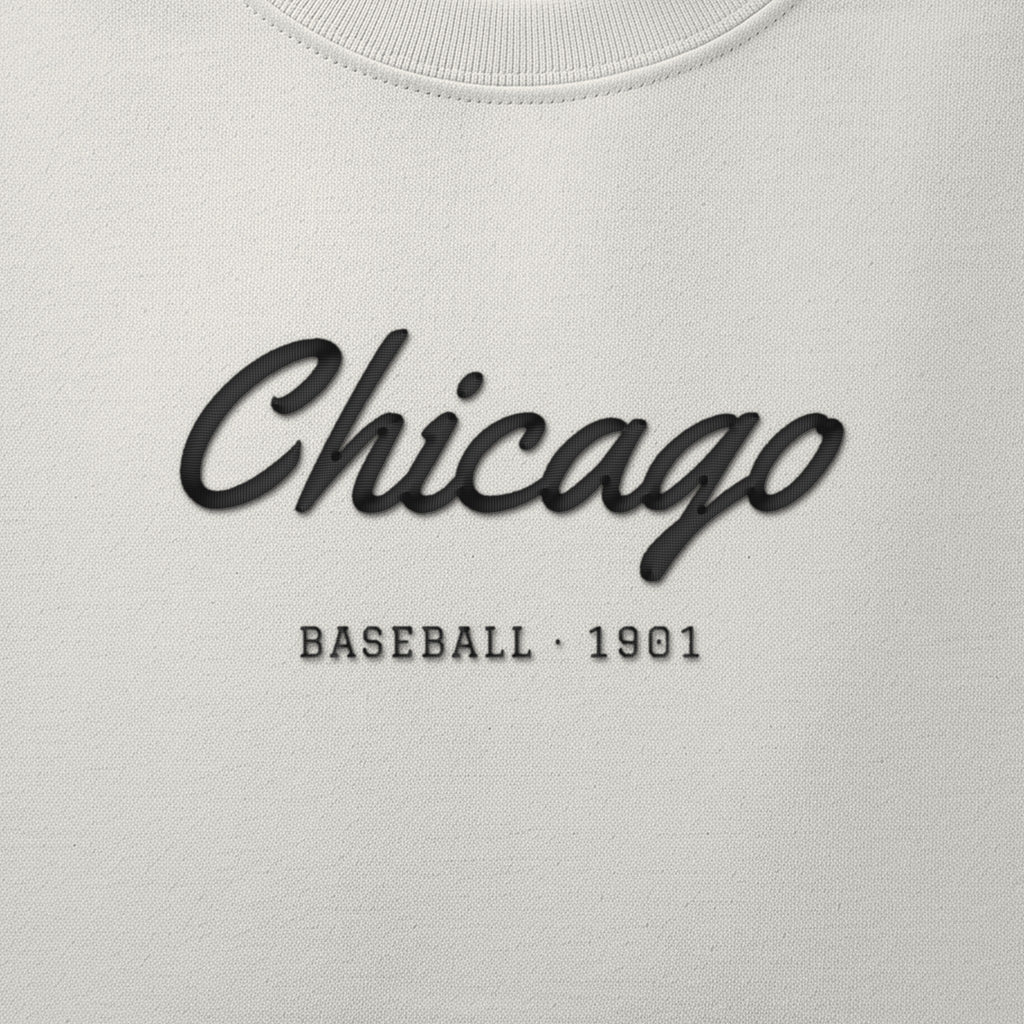 Close-up of the black satin-stitch Chicago Script embroidery