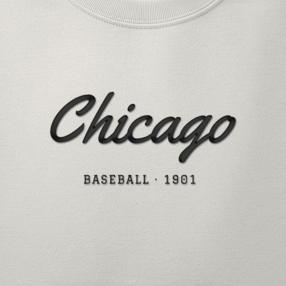 Close-up of the black satin-stitch Chicago Script embroidery