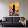 875 North Michigan Canvas Wall Art | Chicago Skyline Above the Fog canvas hanging above a charcoal sofa in a living room