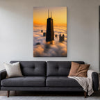 875 North Michigan Canvas Wall Art | Chicago Skyline Above the Fog canvas hanging above a charcoal sofa in a living room