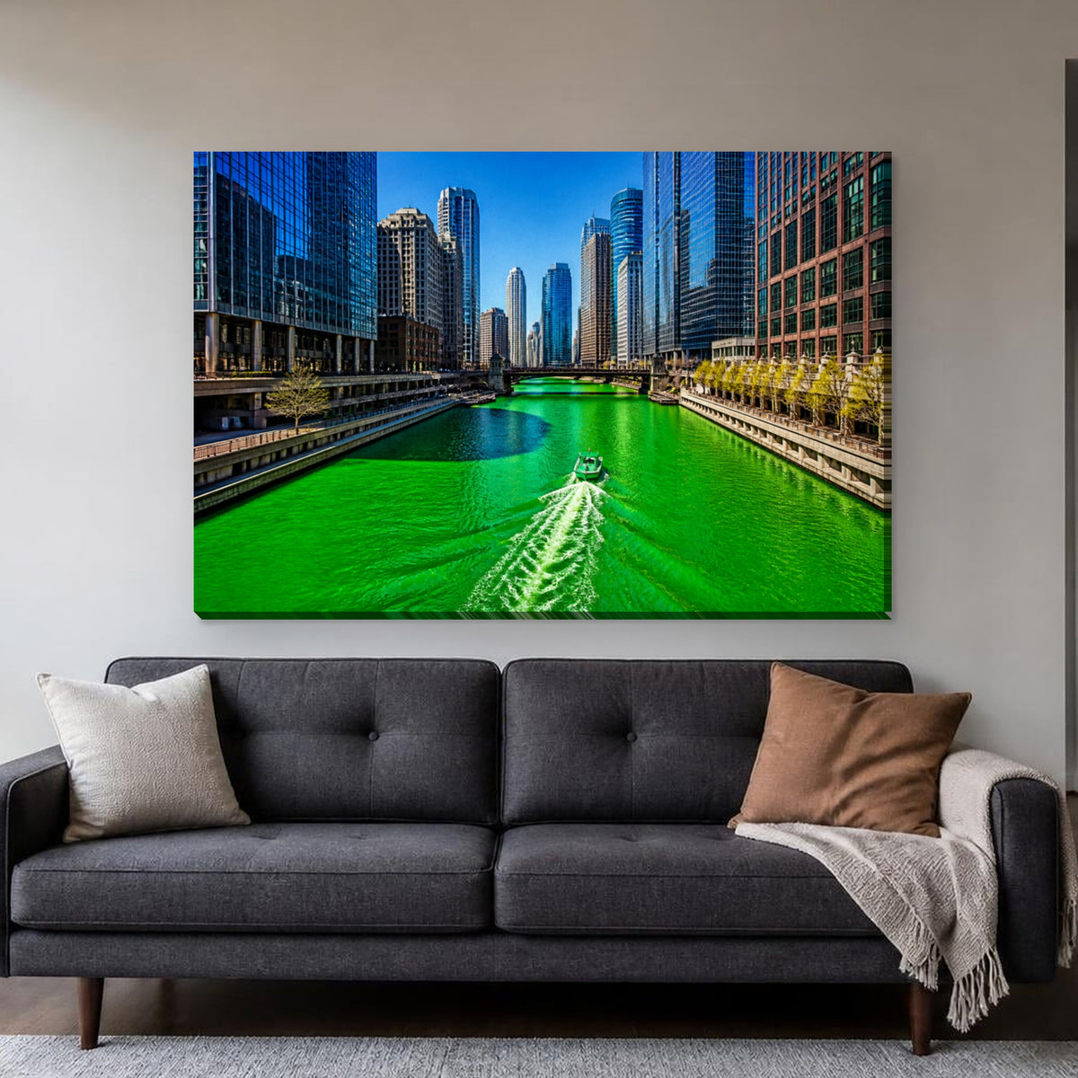 Chicago River Canvas Wall Art | Green River on St. Patrick's Day canvas hanging above a charcoal sofa in a living room