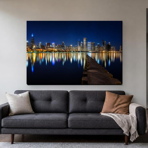 Chicago Skyline Canvas Wall Art | Night from Olive Park canvas hanging above a charcoal sofa in a living room