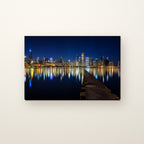 Chicago Skyline Canvas Wall Art | Night from Olive Park canvas on a warm ivory wall