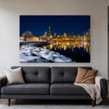 Chicago Skyline Canvas Wall Art | Winter Night from the Planetarium canvas hanging above a charcoal sofa in a living room