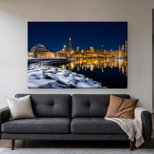 Chicago Skyline Canvas Wall Art | Winter Night from the Planetarium canvas hanging above a charcoal sofa in a living room