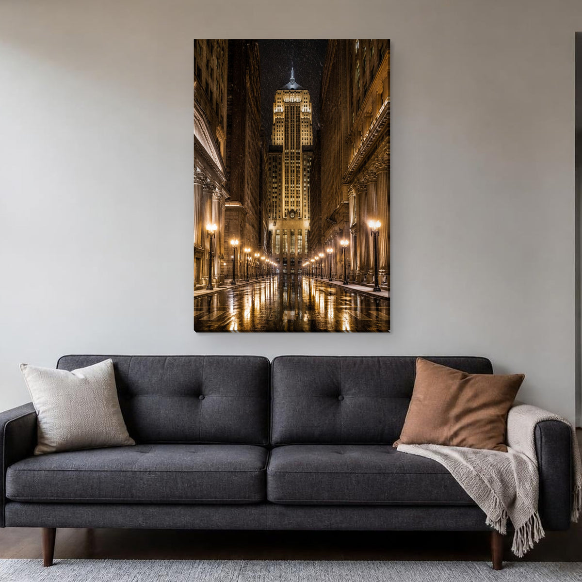 LaSalle Street Canvas Wall Art | Board of Trade on a Snowy Night canvas hanging above a charcoal sofa in a living room
