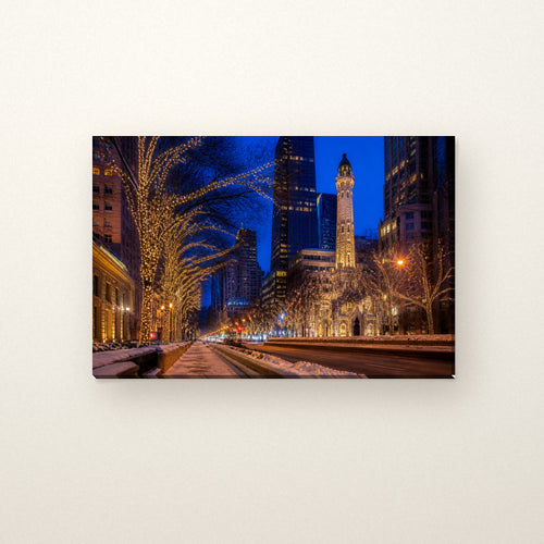 Michigan Avenue Canvas Wall Art | Holiday Lights by the Water Tower canvas on a warm ivory wall