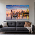 Montrose Harbor Canvas Wall Art | Chicago Skyline at Sunrise canvas hanging above a charcoal sofa in a living room
