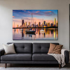 Montrose Harbor Canvas Wall Art | Chicago Skyline at Sunrise canvas hanging above a charcoal sofa in a living room