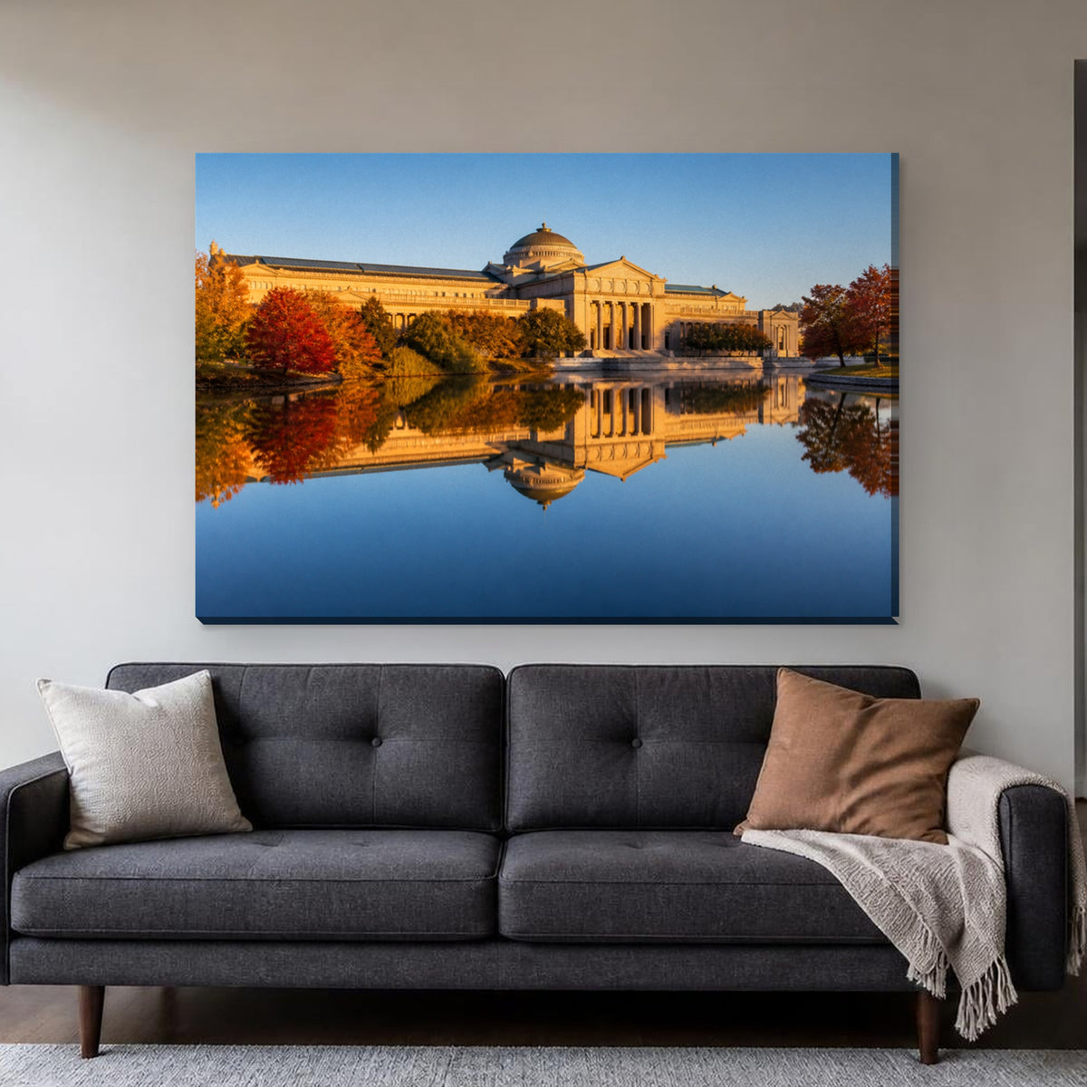 Museum of Science and Industry Canvas Wall Art | Jackson Park in Autumn canvas hanging above a charcoal sofa in a living room