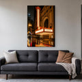 State Street Marquee Canvas Wall Art | Rainy Night in the Loop canvas hanging above a charcoal sofa in a living room