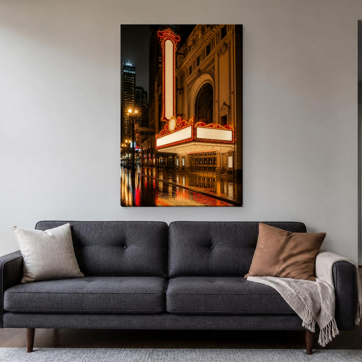 State Street Marquee Canvas Wall Art | Rainy Night in the Loop canvas hanging above a charcoal sofa in a living room