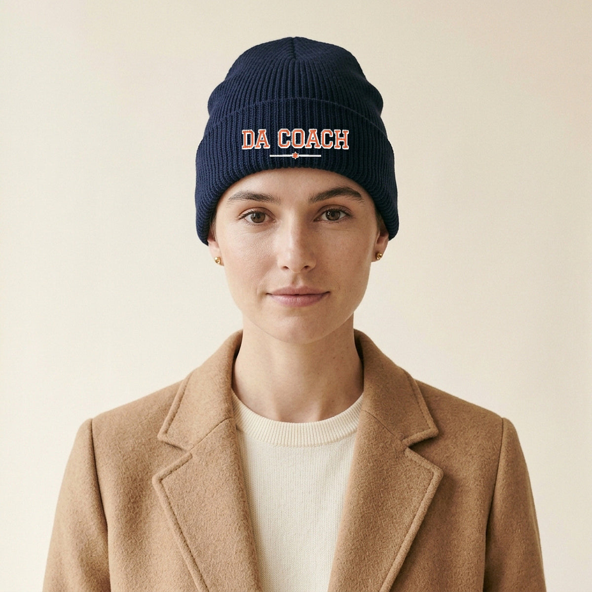 Model wearing the Da Coach Embroidered Cuffed Beanie in Navy