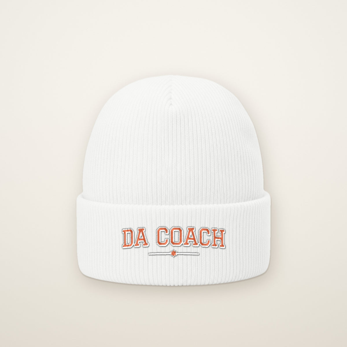 Da Coach Embroidered Cuffed Beanie in White, flat lay on ivory