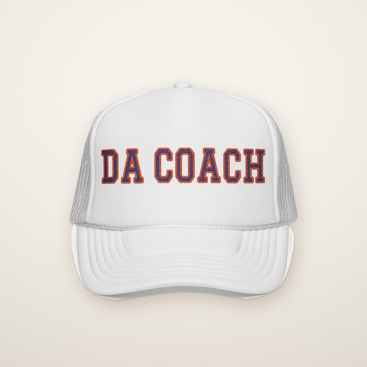 "Da Coach" Embroidered Trucker Hat in White, front view on ivory