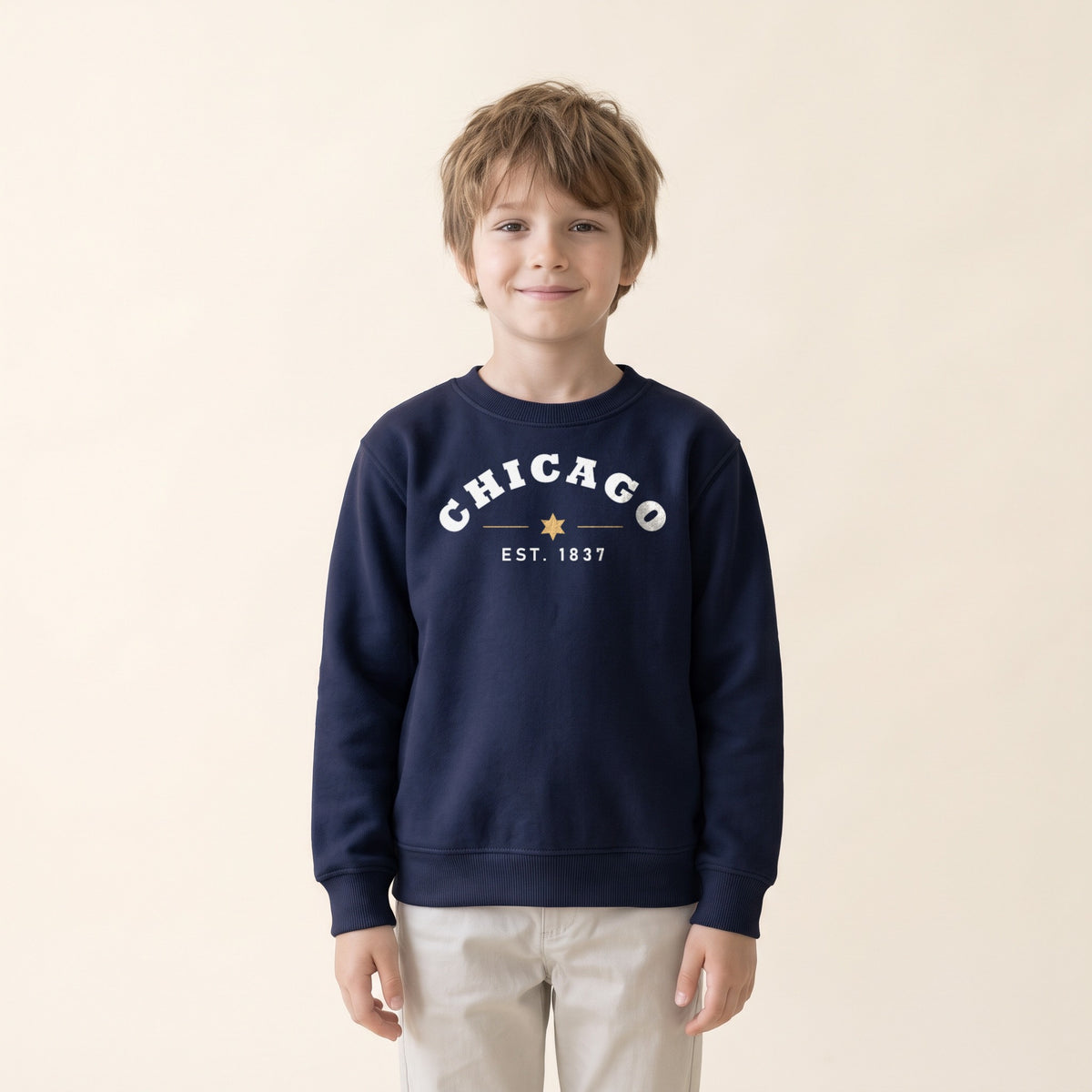 Child wearing the Chicago Est. 1837 Youth Crewneck in Navy
