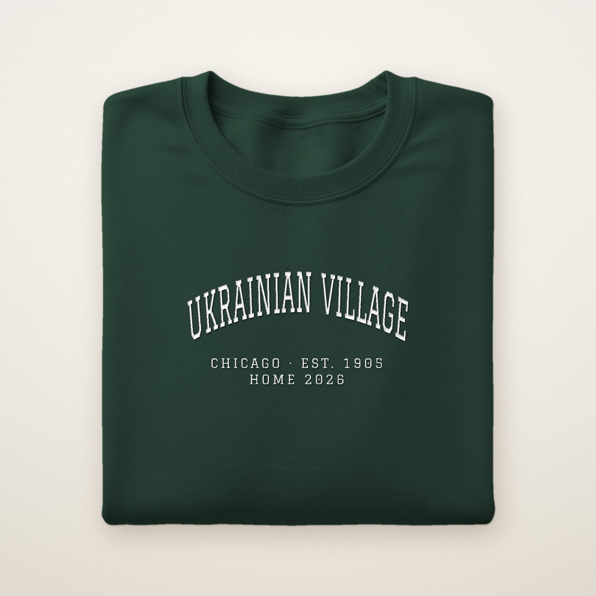 Ukrainian Village Chicago Home 2026 Embroidered Crewneck — White Thread on Forest Green