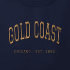 Close-up of gold satin-stitch Gold Coast embroidery