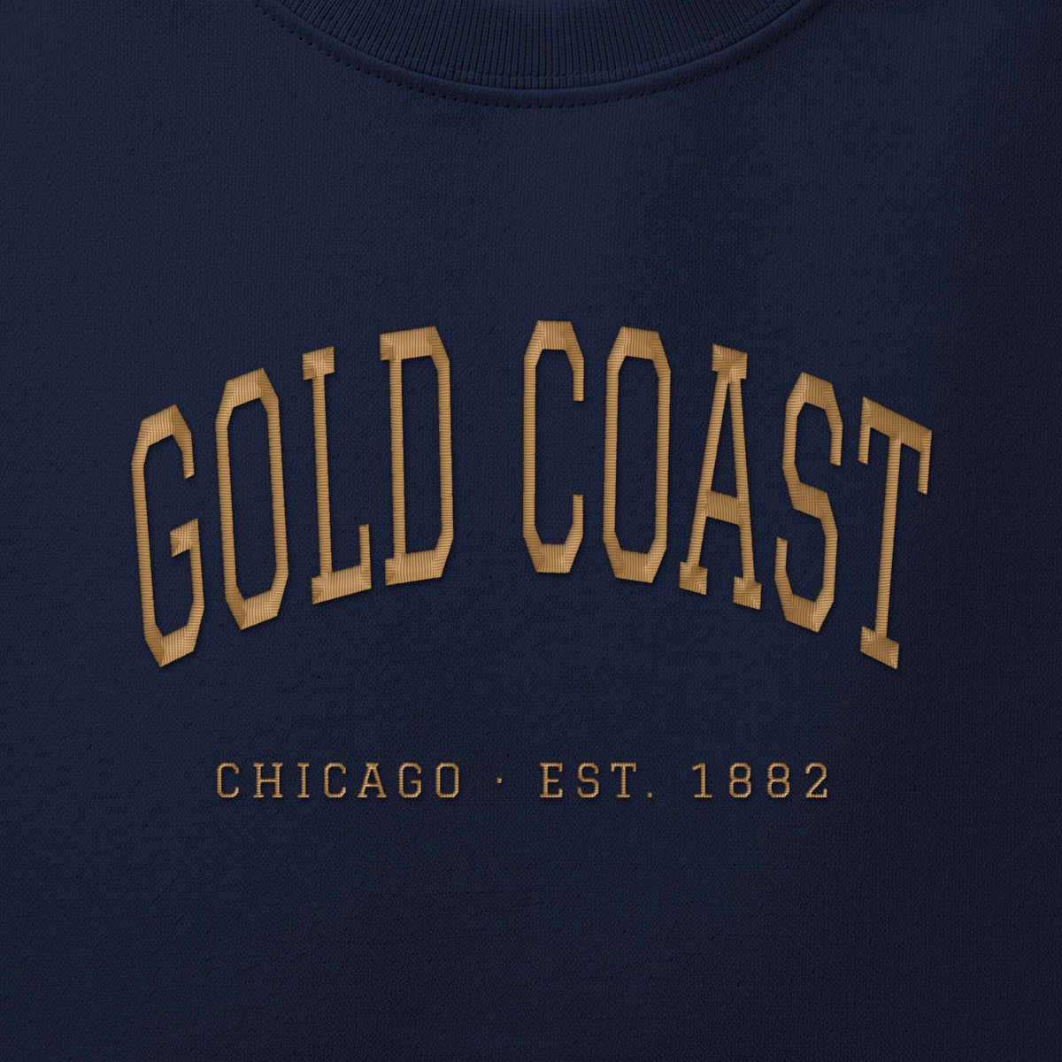Close-up of gold satin-stitch Gold Coast embroidery