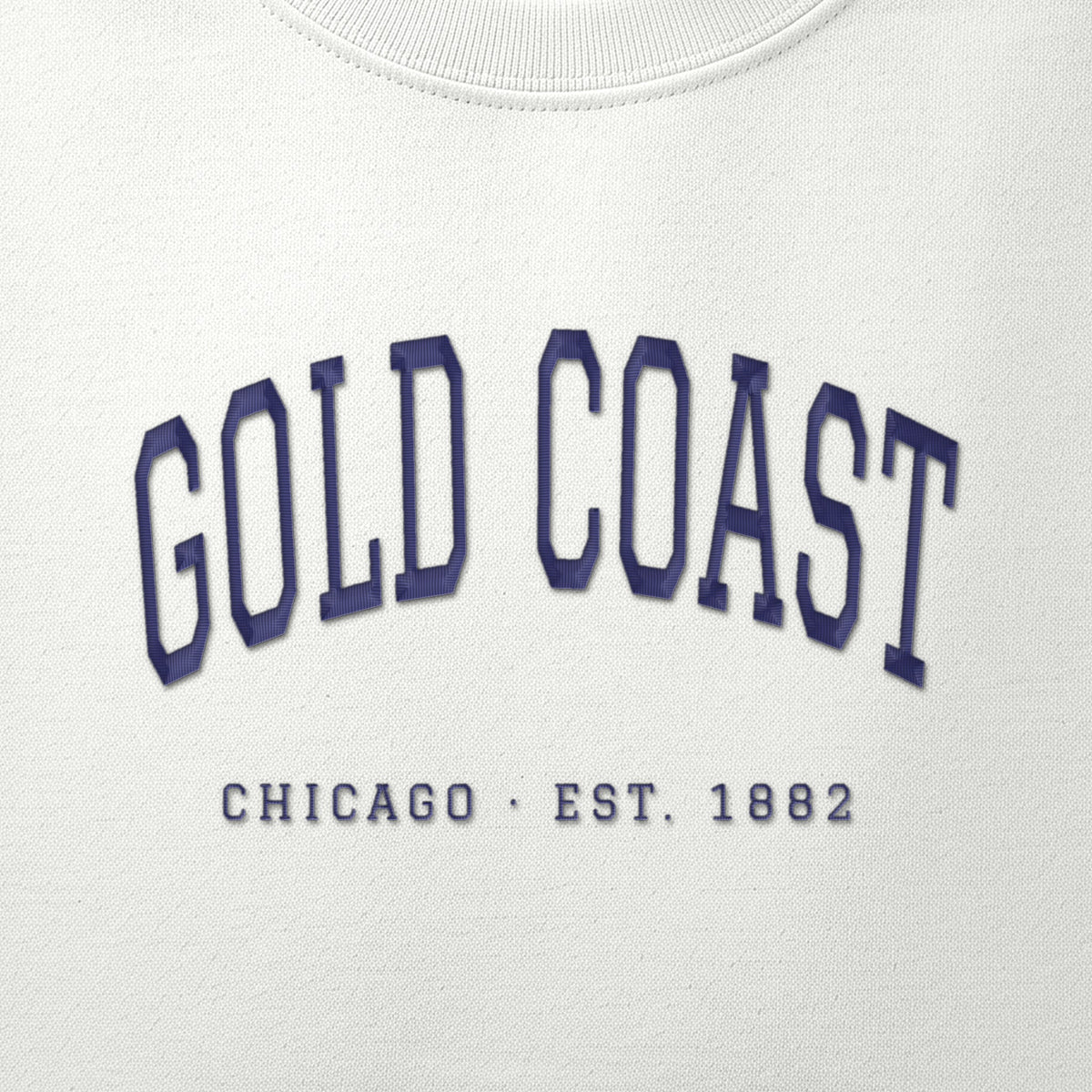 Close-up of navy satin-stitch Gold Coast embroidery