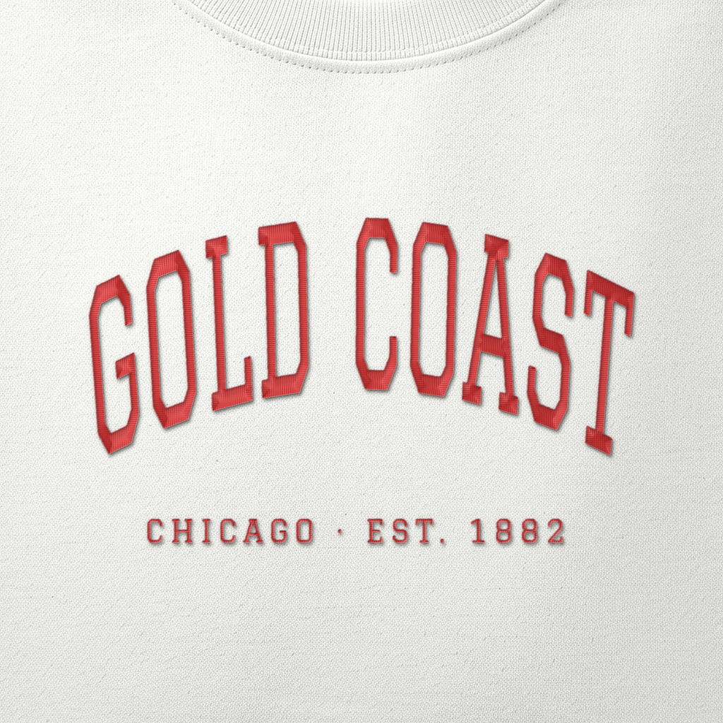 Close-up of red satin-stitch Gold Coast embroidery