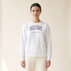 Model wearing the Gold Coast Chicago Embroidered Crewneck — Navy Thread in White