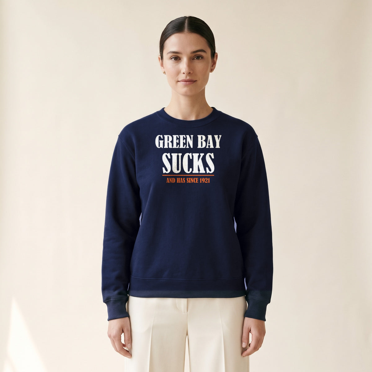 Model wearing the Green Bay Sucks Crewneck — And Has Since 1921 in Navy