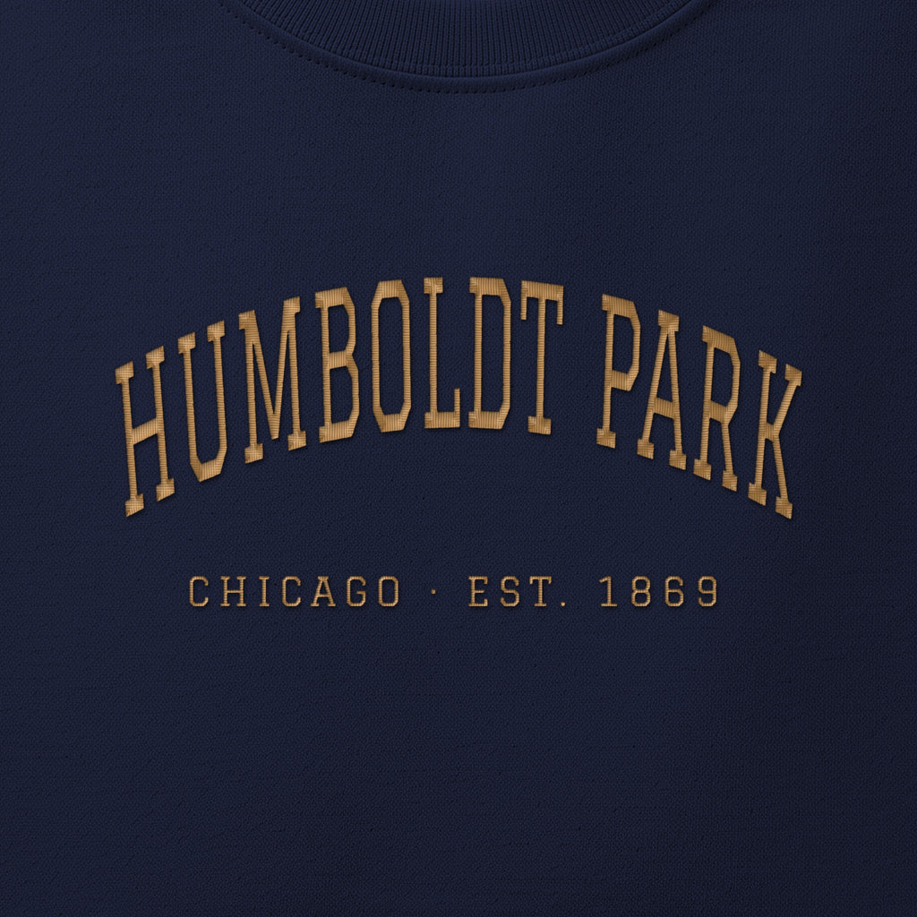 Close-up of gold satin-stitch Humboldt Park embroidery