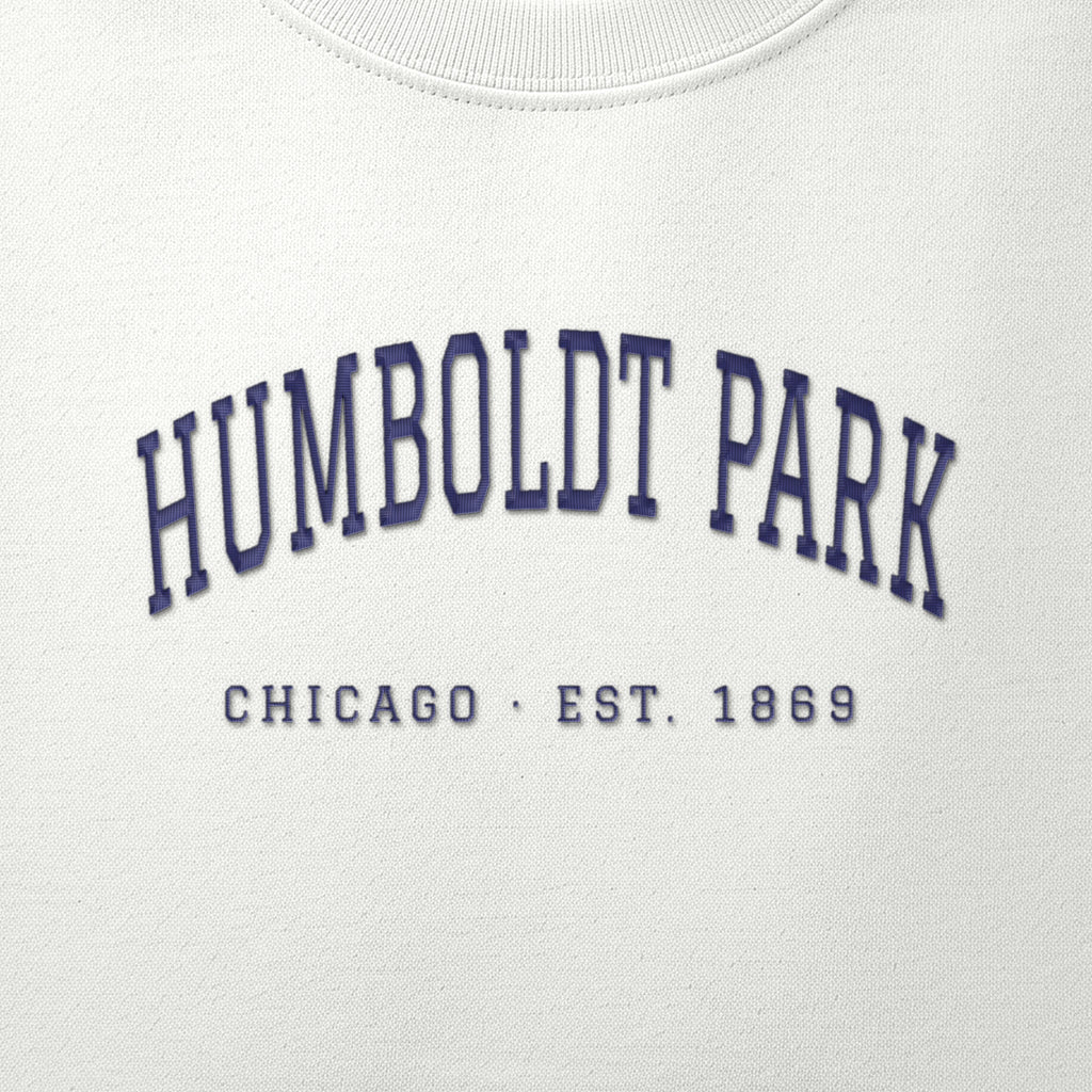 Close-up of navy satin-stitch Humboldt Park embroidery
