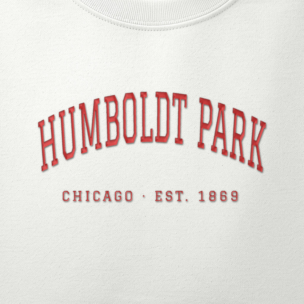 Close-up of red satin-stitch Humboldt Park embroidery