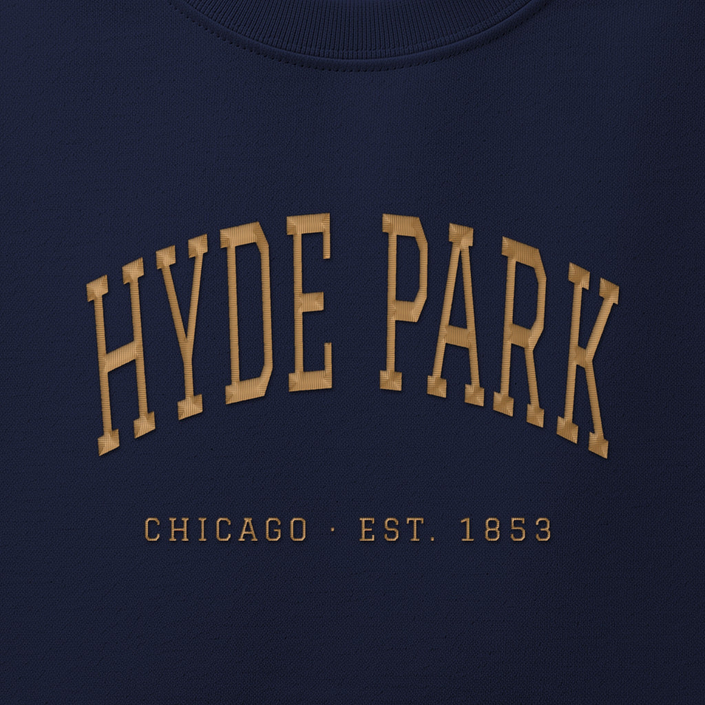 Close-up of gold satin-stitch Hyde Park embroidery