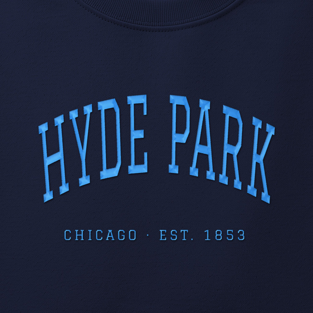 Close-up of sky blue satin-stitch Hyde Park embroidery