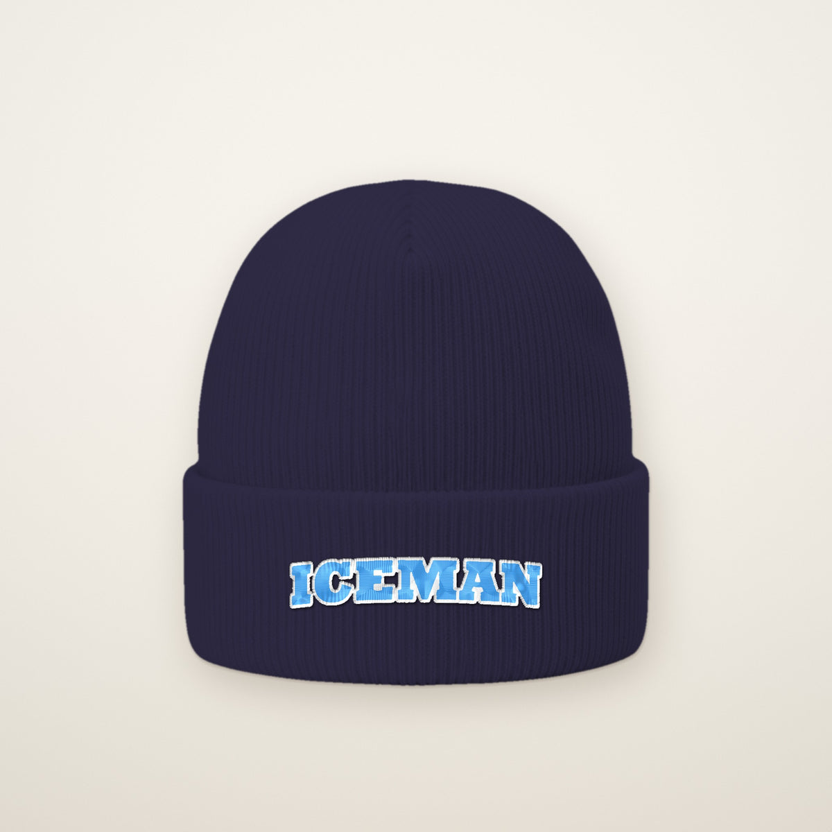 Iceman Embroidered Cuffed Beanie in Navy, flat lay on ivory