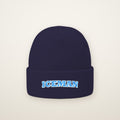 Iceman Embroidered Cuffed Beanie in Navy, flat lay on ivory