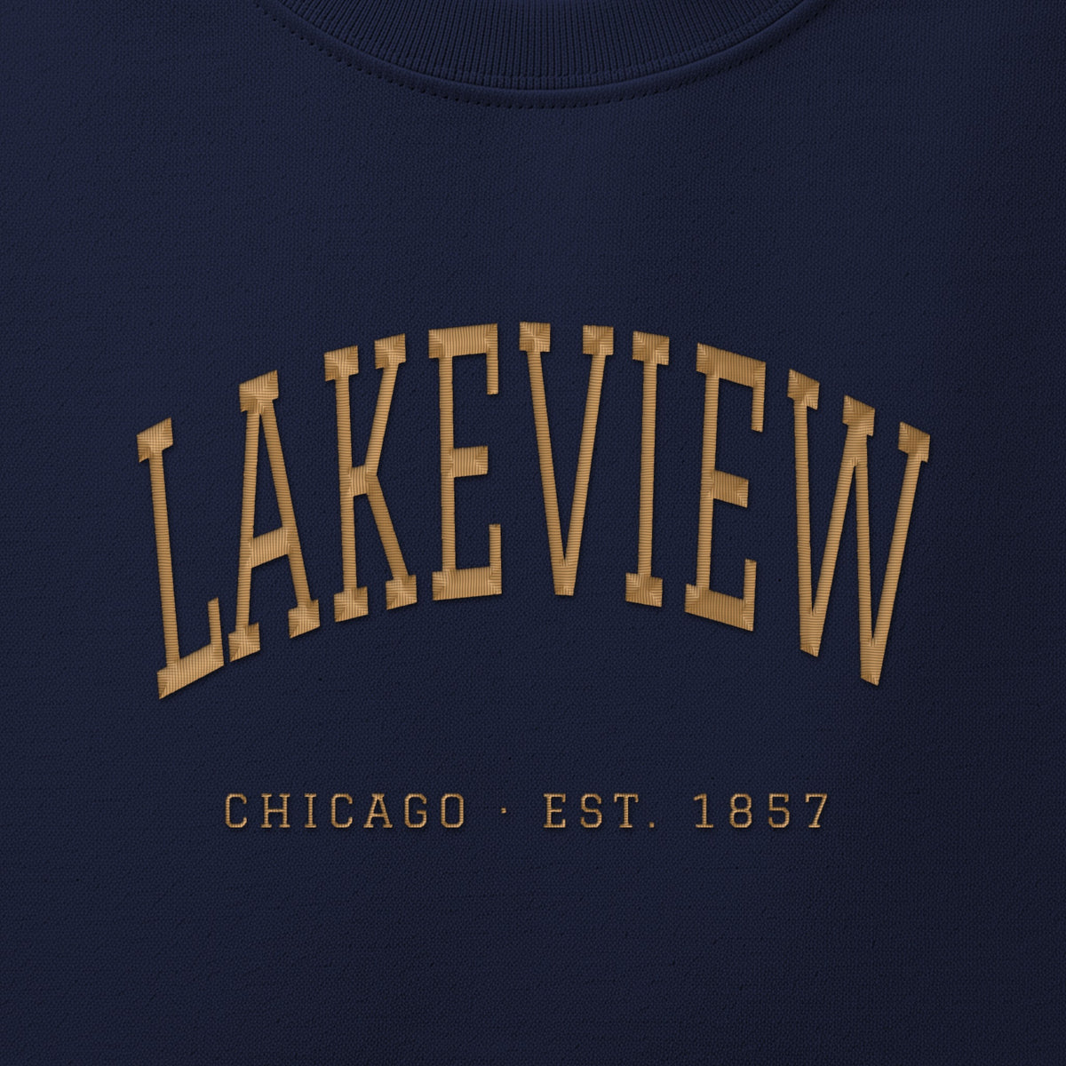 Close-up of gold satin-stitch Lakeview embroidery
