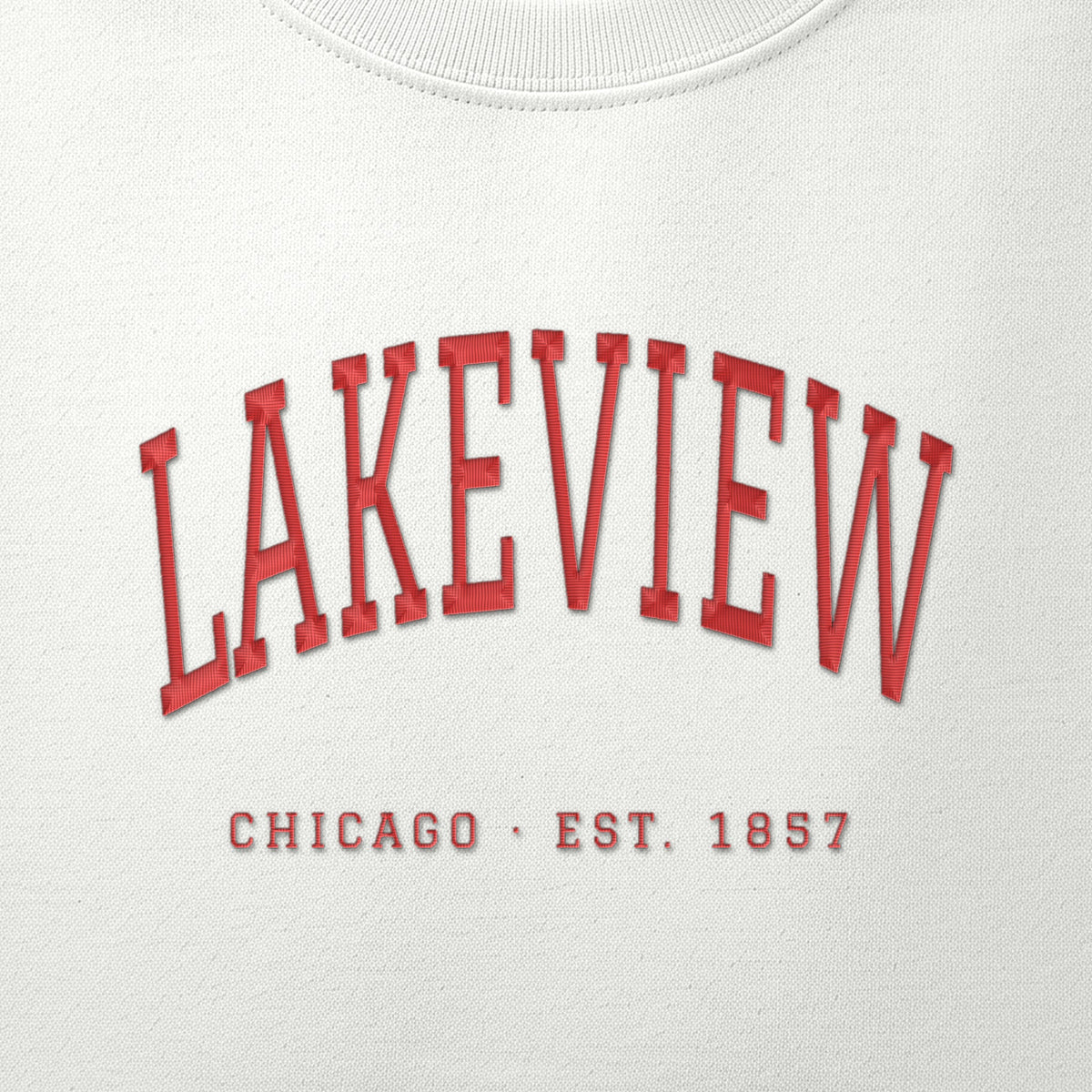 Close-up of red satin-stitch Lakeview embroidery