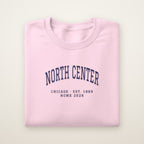 North Center Chicago Home 2026 Embroidered Crewneck — Navy Thread on Light Pink