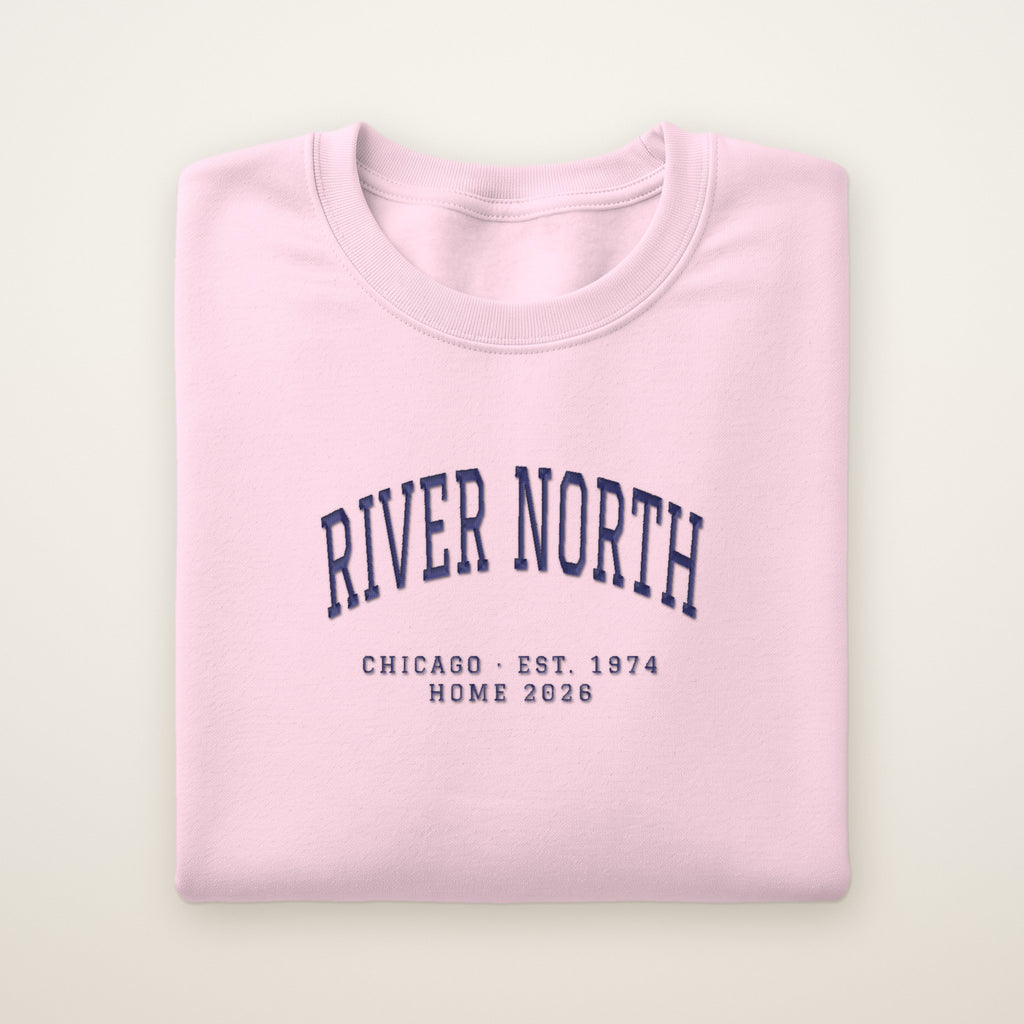 River North Chicago Home 2026 Embroidered Crewneck — Navy Thread on Light Pink