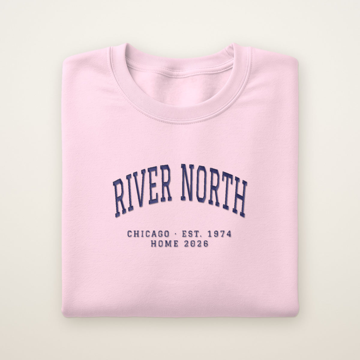River North Chicago Home 2026 Embroidered Crewneck — Navy Thread on Light Pink