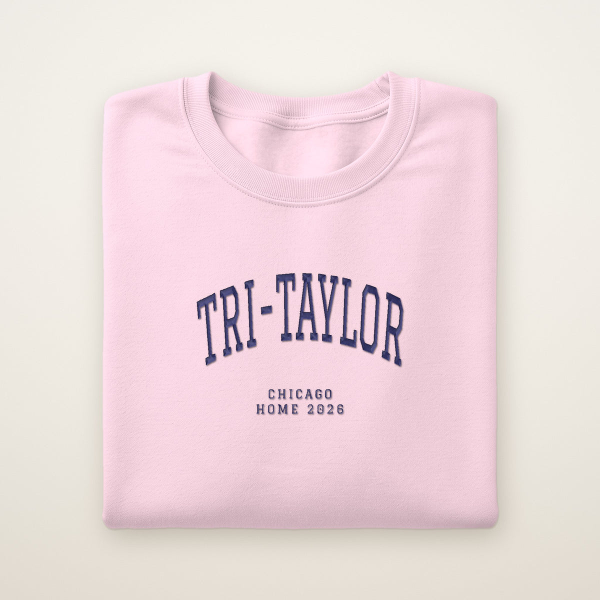 Tri-Taylor Chicago Home 2026 Embroidered Crewneck — Navy Thread on Light Pink